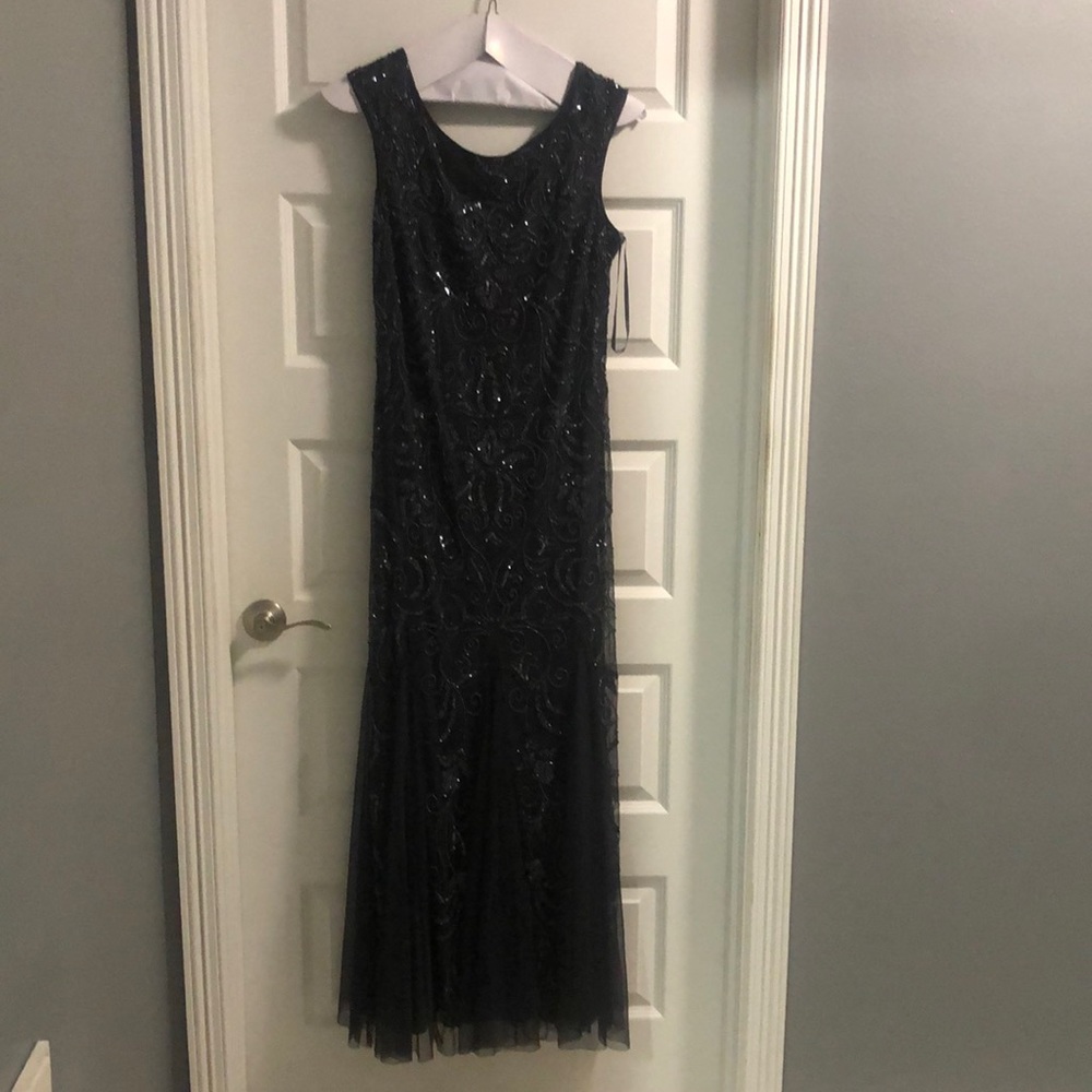 Beautiful night dress worn once for my sons wedding.